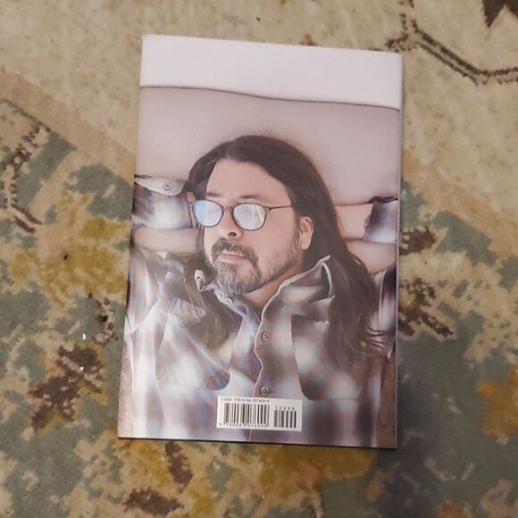 The Storyteller: Tales of Life and Music is a memoir by Dave Grohl, the drummer - Picture 3 of 8